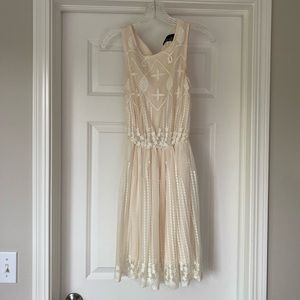 Cream embroidered overlay dress